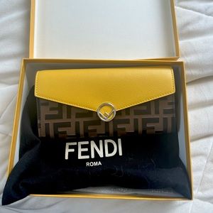 Brand new fendi clutch with silver chain to wear as a cross body